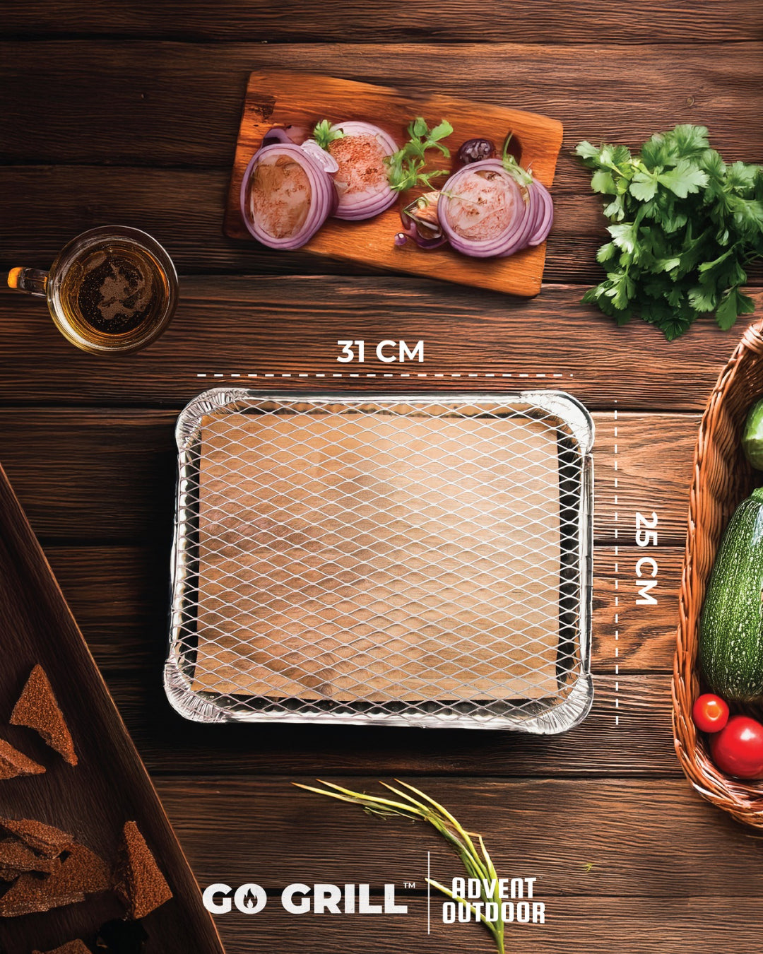 Advent Outdoor Go Grill BBQ kit showing 31x25 cm dimensions, ideal for outdoor cooking, surrounded by fresh veggies and grilling essentials